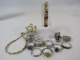 10 X 925 Silver rings, silver bracelet and a rolled gold cuff bracelet.