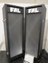 Large cased pair of FEL Disco lights. 31 inches tall. Working condition unknow. Sold as seen, See