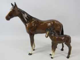 Beswick bay mare and foal figurines.