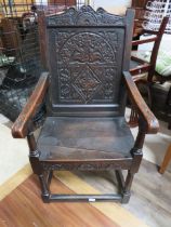 Jacobean/Gothic Revival throne style chair with pegged joints, hand carved rear, some later restorat