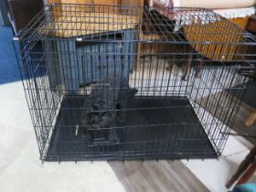 Large dog crate with plastic base. Doors to one end and front. Excellent condition… see photos. S2