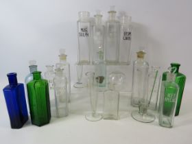 Good selection of various vintage medicine bottles.