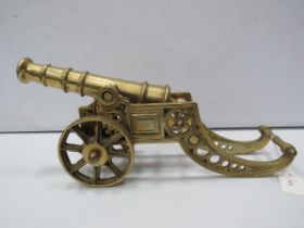 Large solid brass cannon, approx 17.5" long and 8" tall.