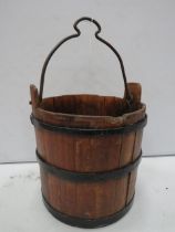 Vintage oak well bucket with cast iron fittings, 19" tall to the top of the handle,