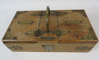 Antique oak smokers travel box brass mounts, handle and 2 compartments. 11" by 6" by 13"