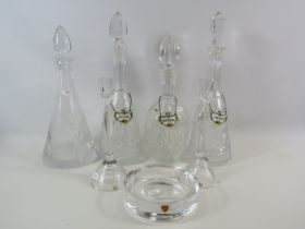 4 crystal glass decanters, 3 decanter labels, Kosta boda candle sticks and Orrafors dish.