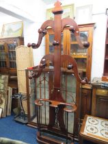 Lovley late Victorian/Edwardian Mahogany Hall stand with turned hat racks on scrolled limbs. Scrolle