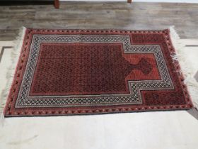 Iranian made woolen rug with fringed edges which measures 60 x 35 inches. Excellent condition. See