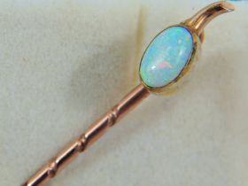 Yellow metal Opal set pin. No hallmark visable but chem testing as 9ct. See photos.