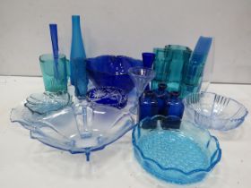 Large selection of modern and vintage blue art glass.