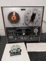 AKAI GX-M-11D Stereo Tape Recorder. No packaging. Lights come on when plugged in but working conditi