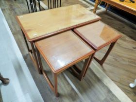 Late 20th Century nest of tables with glass tops. Largest measures H:28 x W:30 x D:18 Inches. See