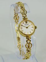 Accurist ladies watch with 9ct case and strap. Total weight 10.1g . Non runner for spares or repairs