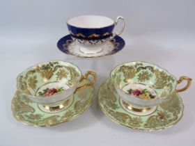 2 Paragon cabinet cups and saucer with Rose pattern centres plus one by Aynsley.