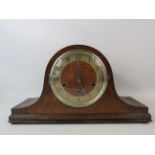 Oak cased chiming mantle clock, approx 9" tall and 16" long. For spares or repair.
