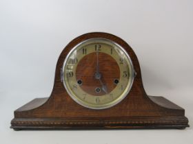 Oak cased chiming mantle clock, approx 9" tall and 16" long. For spares or repair.