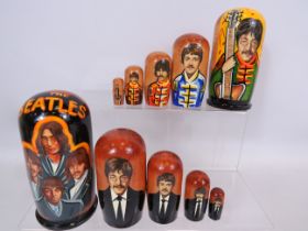 Two wooden nesting dolls, Beatles. Brand new and unused American Imports. Each measures approx 4 in