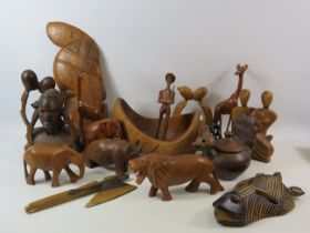 Large collection of carved wooden sculptures and figurines etc.