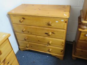 Nicely made Knotty pine four drawer chest. Turned handles with matching bracket feet it measures H:3