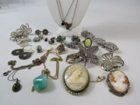 Sterling silver and costume jewellery brooches, necklaces, rings etc.