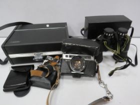 Yashica Camera, carry box and accessories plus a pair of Miranda 10 x 50 binoculars.