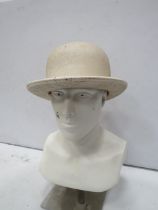 Vintage Bowler hat that has beeen painted white.