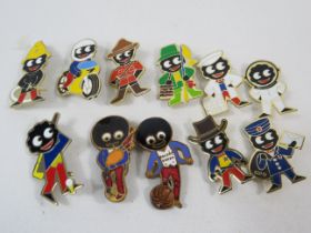 11 Robertson jam pin badges.