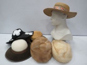 Selection of ladies hats including straw and fur.