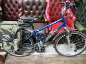 Claude Butler Adventurer 100 Gents bike with front suspension and 18 gears. Gel seat, Mudguards wit