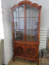 Lovely Flame mahogany veneer display cabinet with glazed double doors to top section . Locking doors