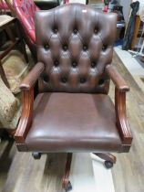 Lovely Dark Brown Chesterfield style button backed office or study chair. Height adjustable and set