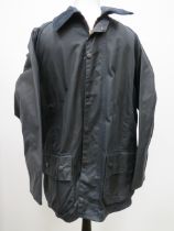 Mens dark blue Beaufort wax Barbour jacket size medium. Appears to be unused.