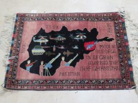 Highly unusual Eastern made woolen rug with long fringed edges. Afghan made. Measures 40 x 28 inche