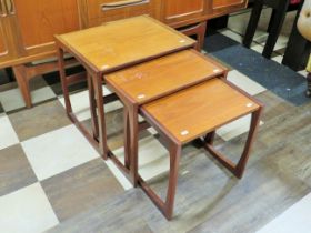 Nest of three, Late 20th Century Teak stacking tables. Tallest measures 19 x 21 x 16 Inches. See pho