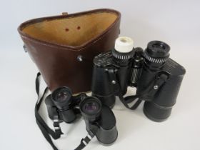 2 pairs of Vintage binoculars Nikon 8 x 30 and Wallace Heaton 7 x 50.