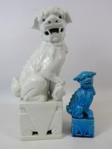 Large white chinese Foo dog plus a smaller Turquoise Foo dog. The tallest measures 12".
