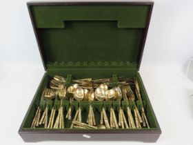 48 Piece gold coloured bamboo cutlery set in wooden case.