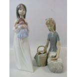 2 Nao Lladro figurines, a girl with a doll and a girl with a basket of flowers and a bird the