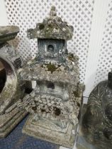 Cast concrete oriental style pagoida. 28 inches tall. Very good condition. See photos. S2