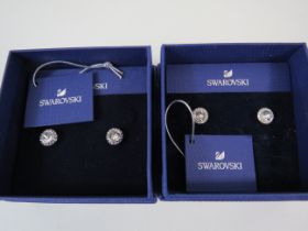 2 pair of Swarovski earrings with boxes.