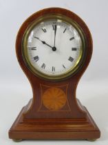 Buren mahogany balloon mantle clock with swiss movement in working condition.