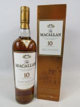 Collectors Bottle of Ten Year old Macallan Scotch Whisky matured in Sherry Oak Cask. Unopened condit