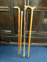 Four assorted walking sticks. See photos. S2
