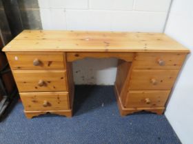 Solid Pine Dressing table with central kneehole with three banks of drawers each side. Measures H:3