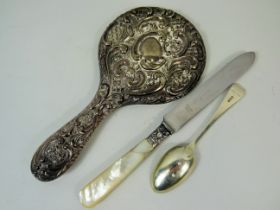 Mixed Silver lot to include a hallmarked Silver backed repousse mirror with bevelled glass, a silve