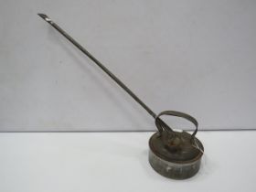 Vintage aluminium watering can with long spout.