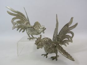A pair of white metal fighting cockeral figures, approx 5 1/4" tall.