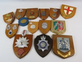Selection of Military & Police wooden wall plaques.
