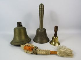 2 brass handbells and a brass out door bell. The tallest handbell measures approx 12.5" tall.