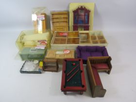 Selection of mainly unused doll house furniture.